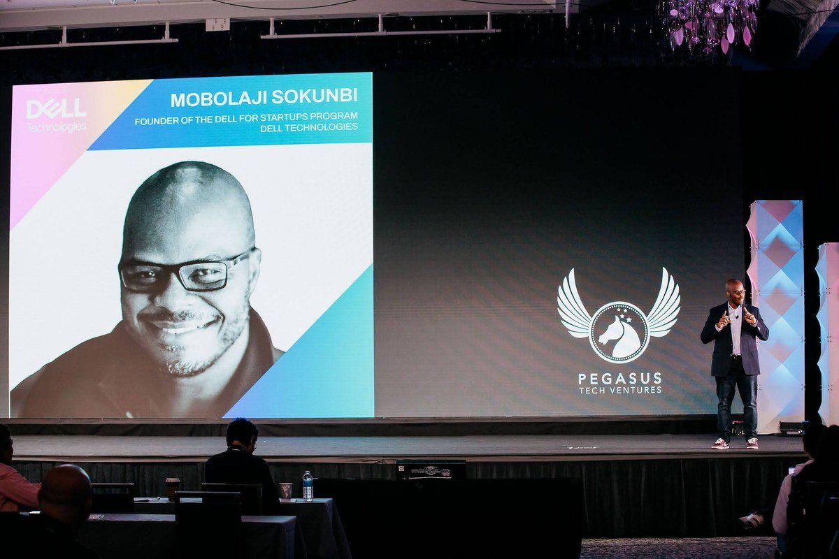 Mobolaji on the main stage at the Startup World Cup Final