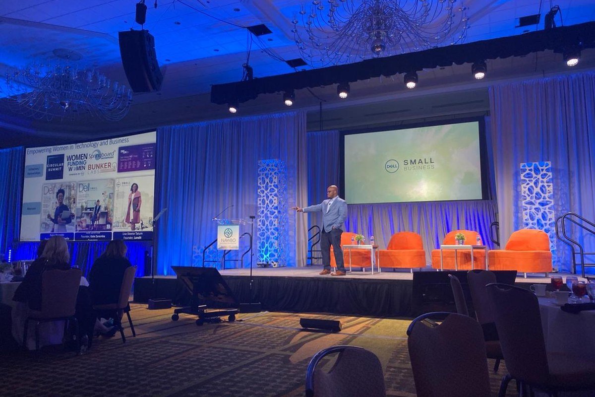 Mobolaji on stage at the NAWBO national conference