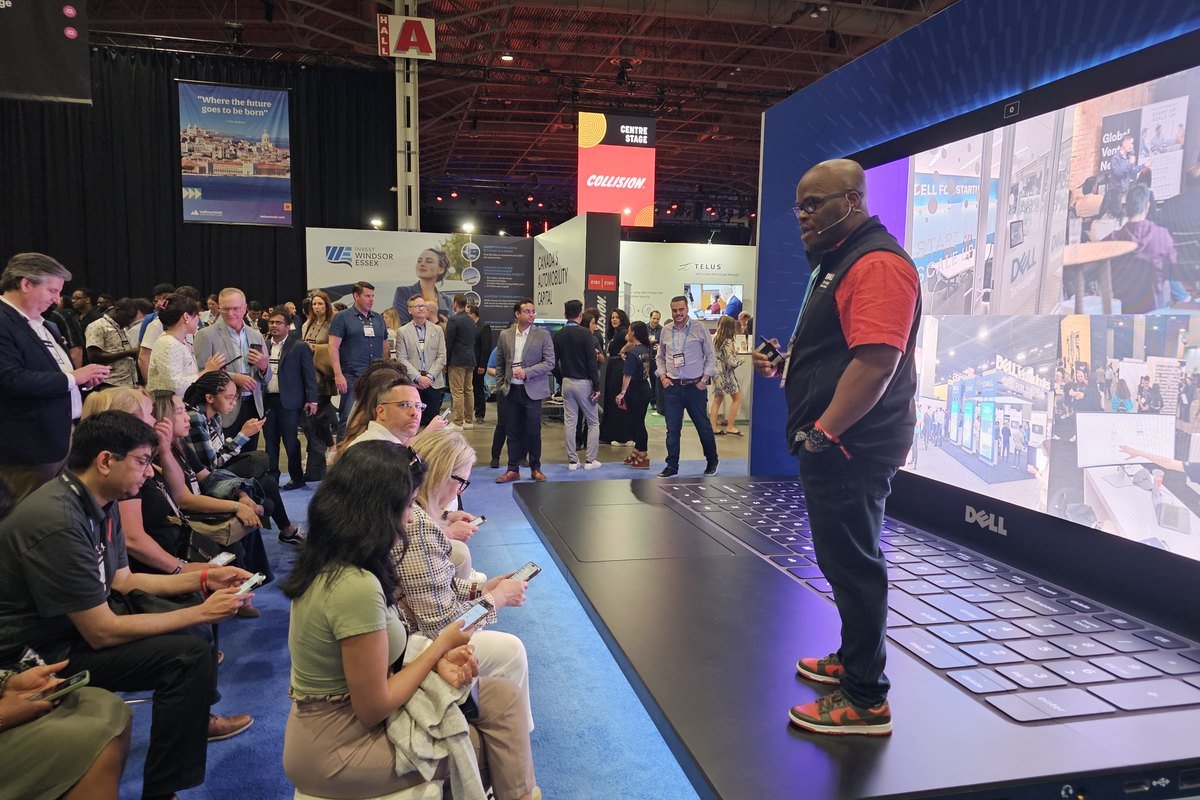 Mobolaji on stage at Collision Conference
